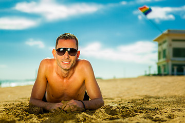 Image showing sexy young man at the beach