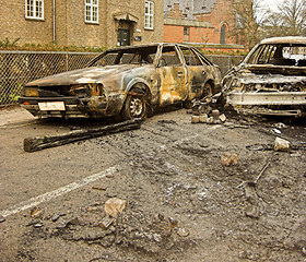 Image showing two burnt-out cars