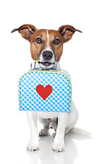 Image showing dog with a small luggage with a big heart