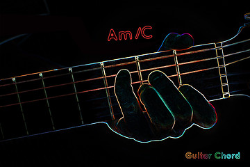 Image showing Guitar chord on a dark background