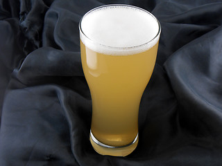 Image showing Frosty glass of light beer set