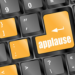 Image showing Computer keyboard with applause key - business concept