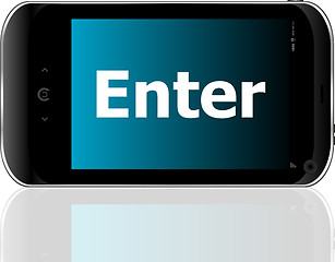 Image showing Web development concept: smartphone with word enter on display