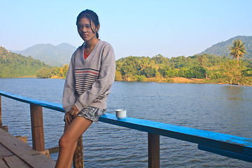 Image showing young girl and hot coffee 