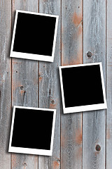Image showing three photos on the background of boards