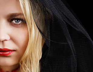 Image showing portrait of blonde young woman in a black veil