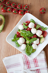 Image showing Salad from tomatoes, mozzarella, basil