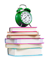 Image showing Clock and books