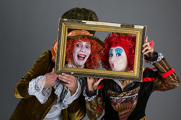 Image showing Characters from wonderland crazy hatter and red queen