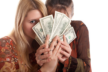 Image showing Girls with  money in hands