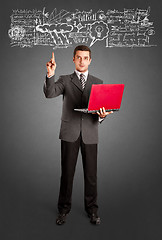 Image showing Business Man Shows Something With Finger