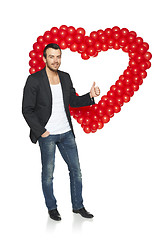 Image showing Man standing with heart shape