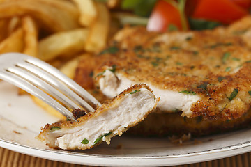 Image showing Chicken schnitzel sliced closeup