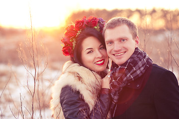 Image showing Happy young couple smiling and hugging