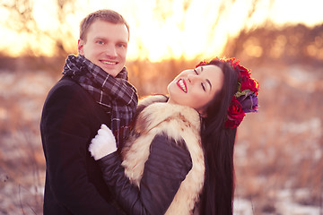 Image showing Happy young couple smiling and hugging