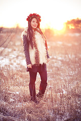 Image showing Young woman in fur vest