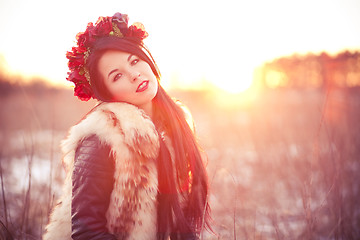 Image showing Young woman in fur vest