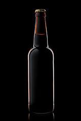 Image showing Beer bottle isolated on black
