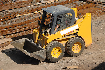 Image showing Yellow earth mover