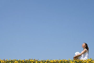 Image showing Pretty woman enjoying sunshine