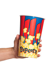 Image showing Hand with popcorn