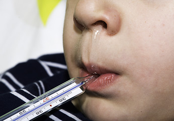 Image showing Sick child in bed.