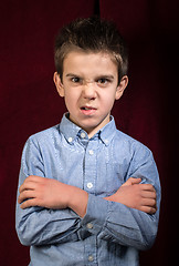 Image showing Frowning boy