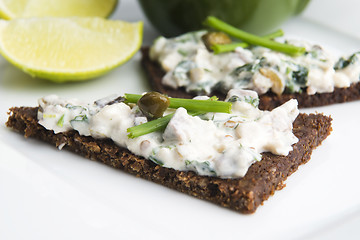 Image showing sandwiches with dark bread, herrings, mushrooms, pepper