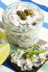 Image showing sandwiches with dark bread, herrings, mushrooms, pepper