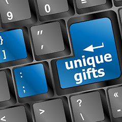 Image showing unique gifts on the keyboard - holiday concept