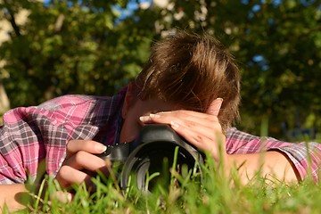 Image showing My beloved one taking photos on the ground