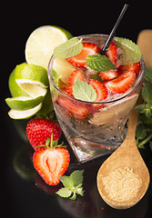 Image showing alcoholic punch cocktail with ice and strawberry