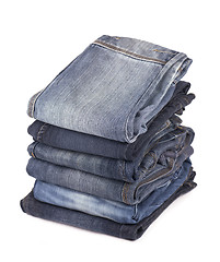 Image showing Stack of blue jeans
