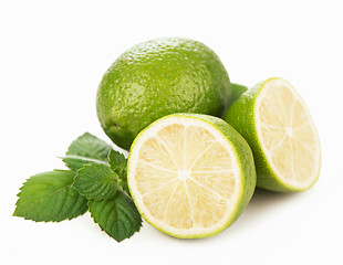 Image showing Fresh limes, mint leaves