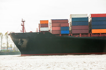 Image showing Fully laden container ship in port