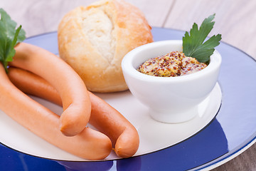 Image showing tasty sausages frankfurter with grain bread 