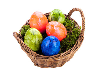 Image showing Basket of brightly coloured Easter Eggs