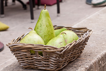 Image showing Fresh ripe pears in a wicker basket