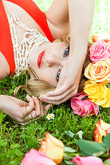 Image showing beautiful woman portrait outdoor with colorful flowers