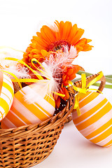 Image showing Colourful yellow decorated Easter eggs