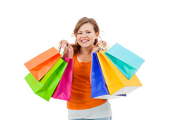 Image showing Happy attractive young shopaholic