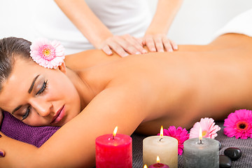 Image showing Beautiful woman having a back massage