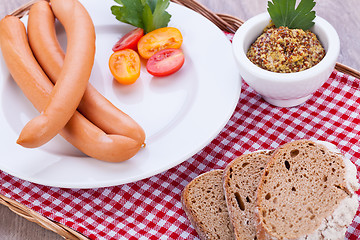 Image showing tasty sausages frankfurter with grain bread 