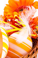 Image showing Colourful yellow decorated Easter eggs
