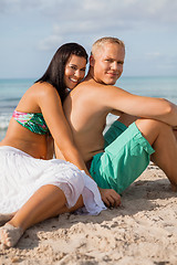 Image showing Happy young couple sunbathing