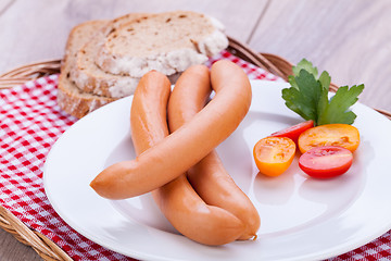 Image showing tasty sausages frankfurter with grain bread 