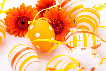 Image showing Colourful yellow decorated Easter eggs