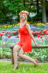 Image showing beautiful woman portrait outdoor with colorful flowers