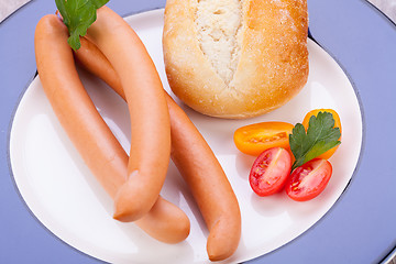 Image showing tasty sausages frankfurter with grain bread 