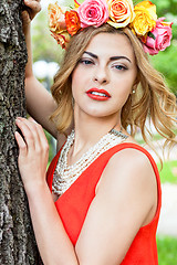 Image showing beautiful woman portrait outdoor with colorful flowers